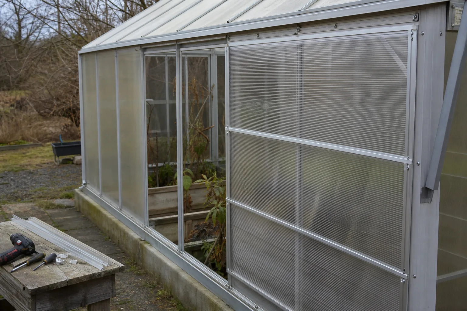 Multiwall polycarbonate panels partly installed in aluminum greenhouse profiles